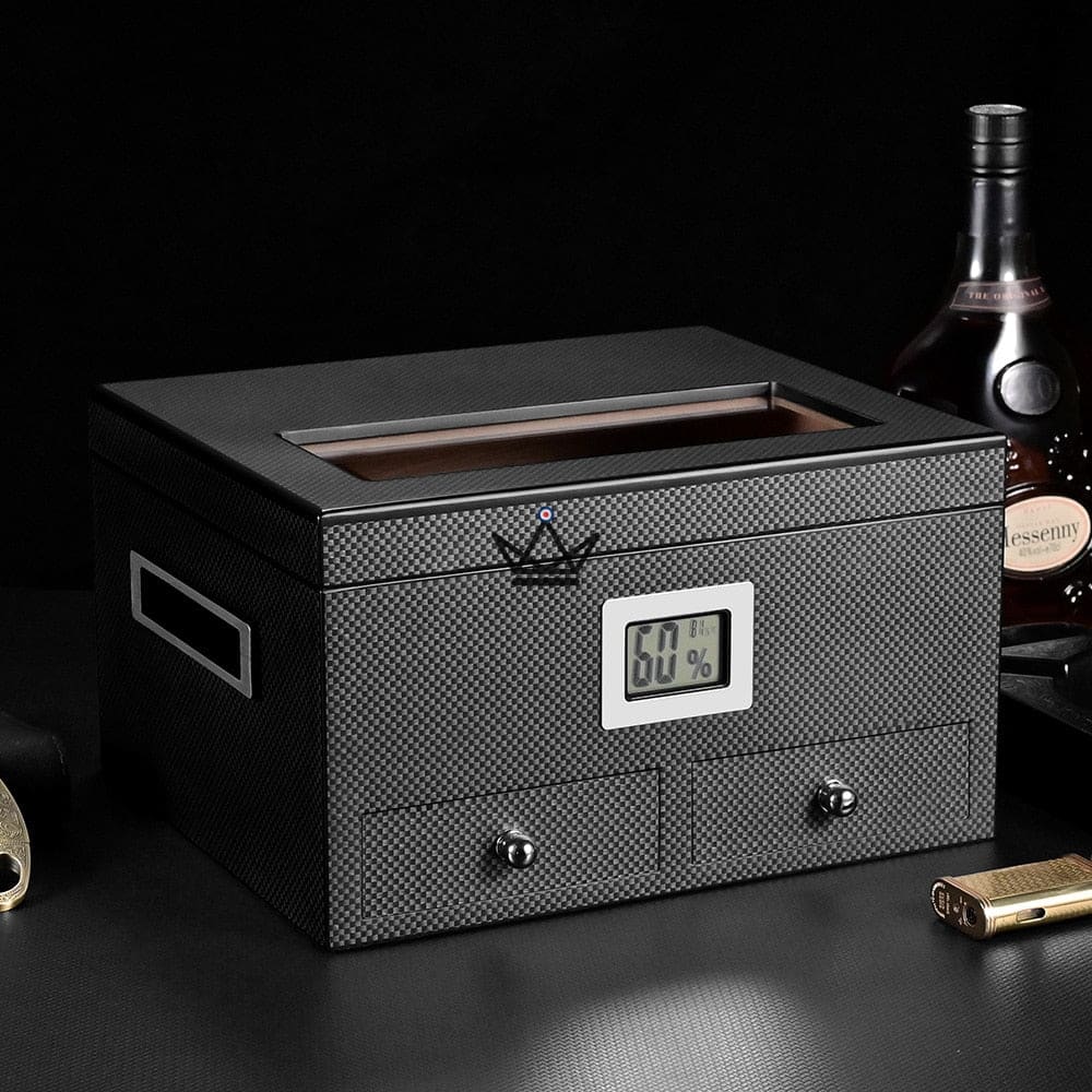 Humidor de cigarros DUNE PRESTIGE — Cedro español, tapa de vidrio, 2 cajones, higrómetro digital, 60 cigarros · Madera de carbón o rosa Humidor de cigarros DUNE PRESTIGE — Cedro español, tapa de vidrio, 2 cajones, higrómetro digital, 60 cigarros · Madera de carbón o rosa